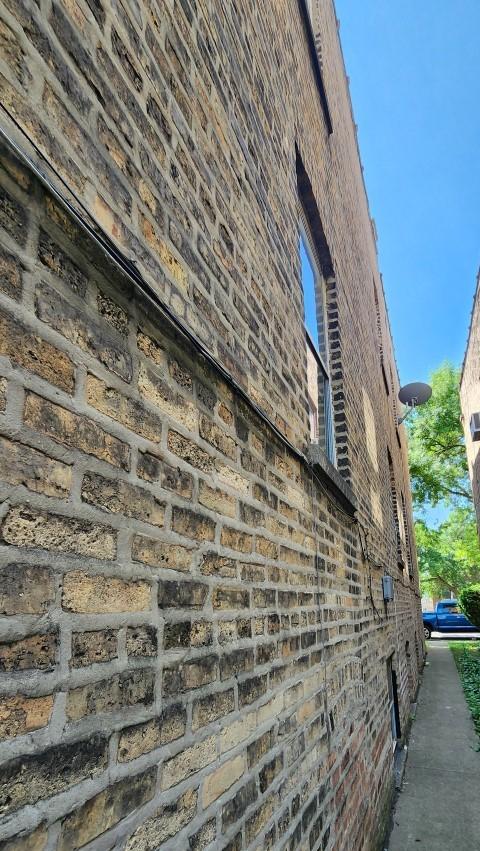 5330 W Foster Ave, Chicago, IL 60630 - view of property exterior featuring brick siding