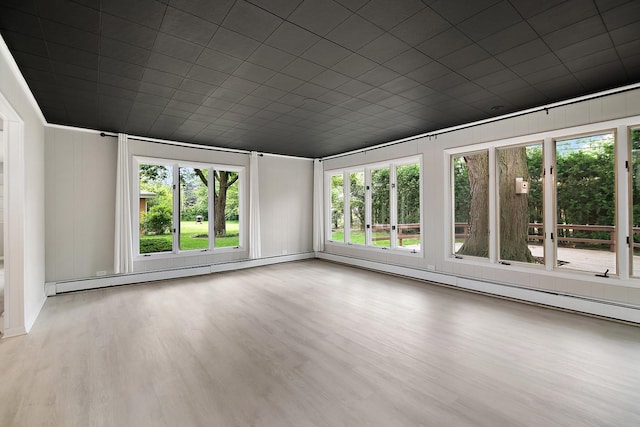 6231 W 127th Pl, Palos Heights, IL 60463 - unfurnished room featuring plenty of natural light, wood finished floors, and a baseboard heating unit