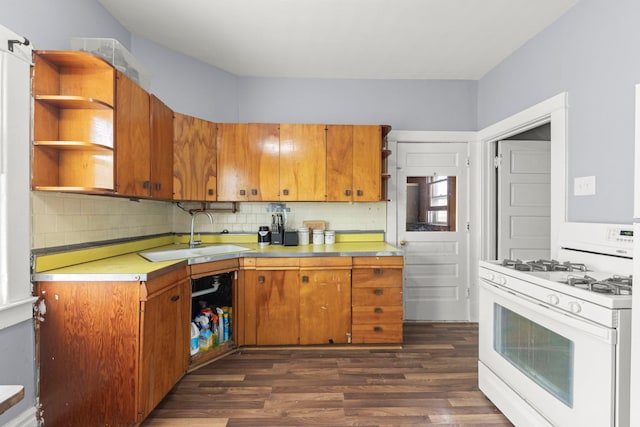 1207 Oakland Ave, Joliet, IL 60435 - kitchen with white gas range oven, open shelves, dark wood-style floors, and light countertops