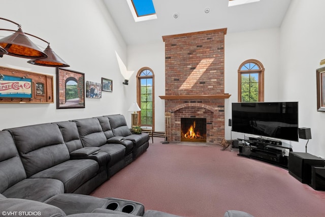 17935 Pheasant Lake Dr, Tinley Park, IL 60487 - carpeted living area with high vaulted ceiling, a skylight, and a brick fireplace