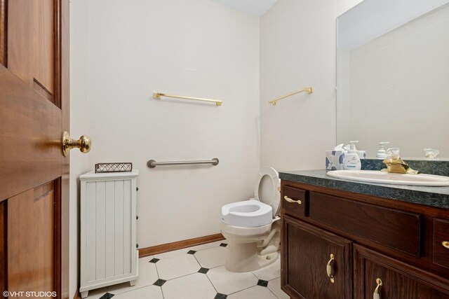 17935 Pheasant Lake Dr, Tinley Park, IL 60487 - bathroom with vanity, tile patterned floors, radiator heating unit, toilet, and baseboards