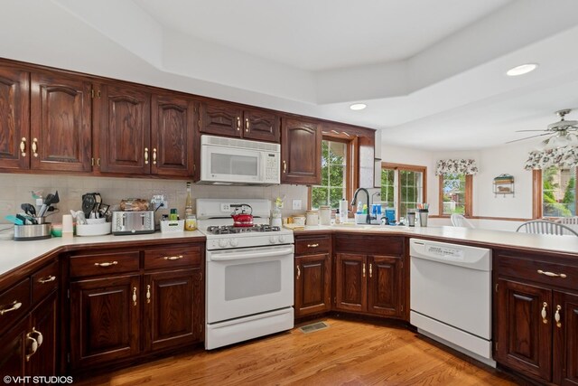 17935 Pheasant Lake Dr, Tinley Park, IL 60487 - kitchen featuring white appliances, light countertops, a sink, ceiling fan, and light wood-style flooring