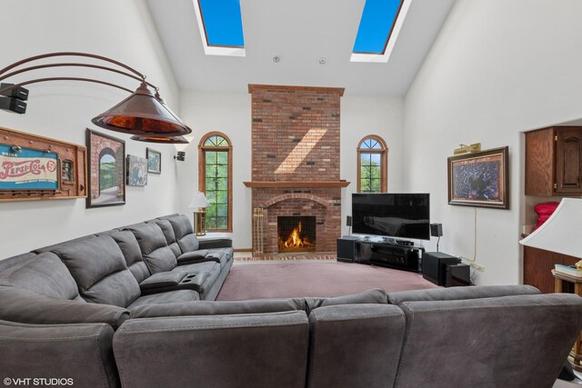 17935 Pheasant Lake Dr, Tinley Park, IL 60487 - carpeted living area featuring high vaulted ceiling, a skylight, and a brick fireplace