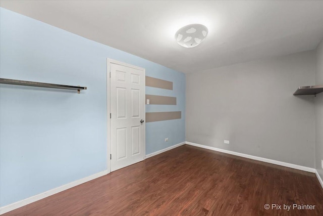 611 Brewster Ln, Schaumburg, IL 60193 - unfurnished room featuring wood finished floors and baseboards