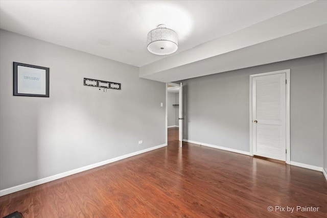 611 Brewster Ln, Schaumburg, IL 60193 - empty room featuring wood finished floors and baseboards