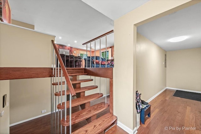 611 Brewster Ln, Schaumburg, IL 60193 - stairs with wood finished floors, baseboards, and recessed lighting