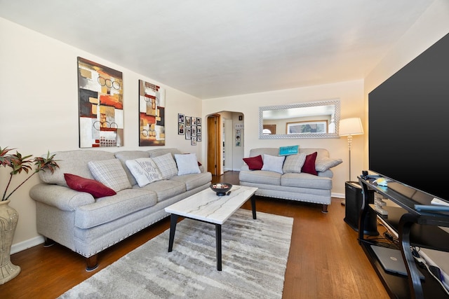 1546 N Lee Blvd, Berkeley, IL 60163 - living room with arched walkways, wood finished floors, and baseboards