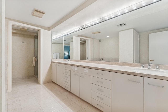132 E Delaware Pl Unit 5504, Chicago, IL 60611 - bathroom featuring double vanity and tile patterned floors