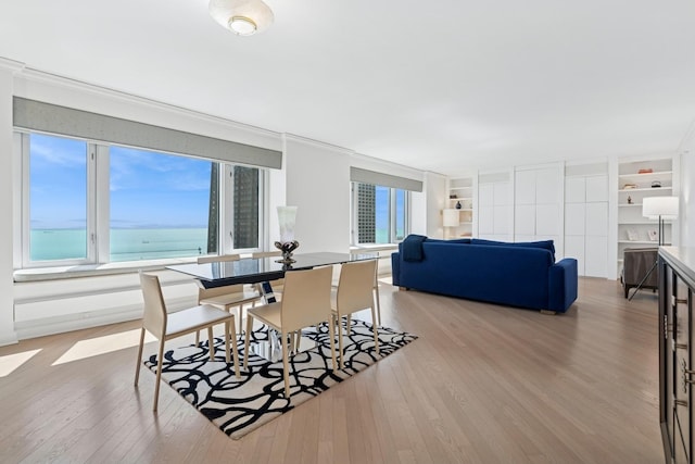 132 E Delaware Pl Unit 5504, Chicago, IL 60611 - dining room with healthy amount of natural light and wood finished floors