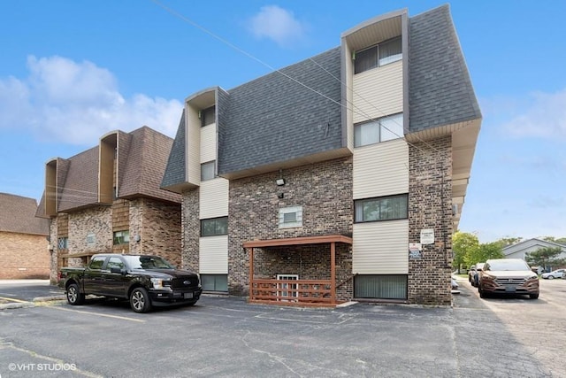 14747 Kenton Ave Unit 3B, Midlothian, IL 60445 - view of building exterior featuring uncovered parking
