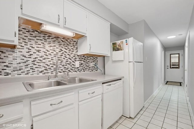 14747 Kenton Ave Unit 3B, Midlothian, IL 60445 - kitchen featuring white appliances, a sink, light tile patterned flooring, light countertops, and white cabinetry