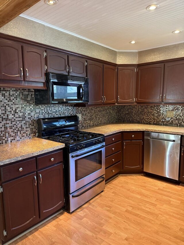 27616 W Rowe Ave, Spring Grove, IL 60081 - kitchen featuring appliances with stainless steel finishes, dark brown cabinetry, light wood-type flooring, crown molding, and decorative backsplash