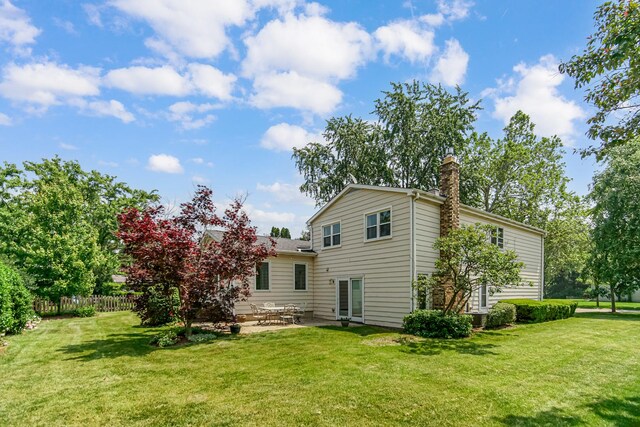 5S640 Bluff Ln, Naperville, IL 60540 - back of house featuring a chimney and a patio