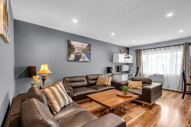 86611/2 W Foster Ave Unit 3A, Chicago, IL 60656 - living area with light wood-style flooring and recessed lighting