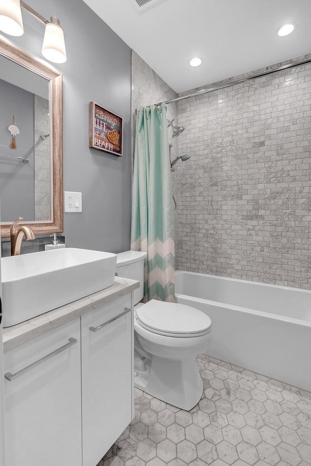 86611/2 W Foster Ave Unit 3A, Chicago, IL 60656 - bathroom with vanity, shower / bathtub combination with curtain, toilet, and recessed lighting