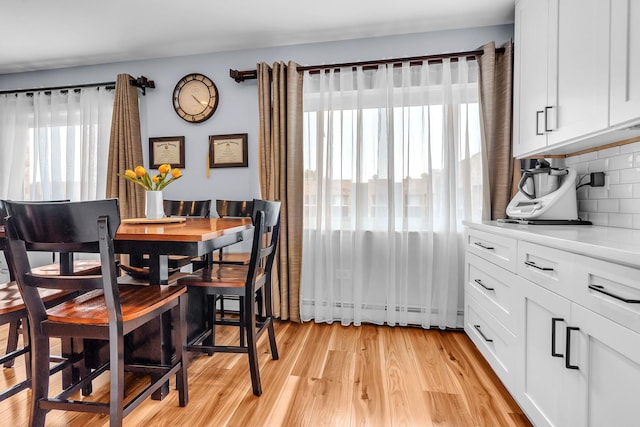 86611/2 W Foster Ave Unit 3A, Chicago, IL 60656 - dining area with light wood-type flooring