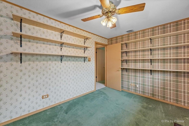 1434 Somerset Ln, Schaumburg, IL 60193 - carpeted empty room featuring ceiling fan and crown molding