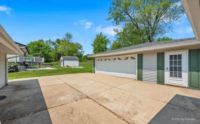 1434 Somerset Ln, Schaumburg, IL 60193 - detached garage with a storage shed and cooling unit