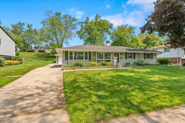 1434 Somerset Ln, Schaumburg, IL 60193 - view of front of home with a front lawn, a chimney, and driveway