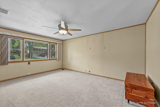 1434 Somerset Ln, Schaumburg, IL 60193 - carpeted empty room with a ceiling fan and baseboards