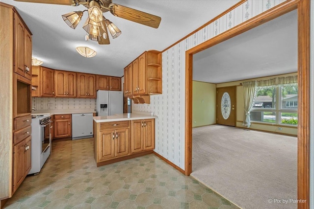 1434 Somerset Ln, Schaumburg, IL 60193 - kitchen with white appliances, ceiling fan, wallpapered walls, baseboards, and open shelves