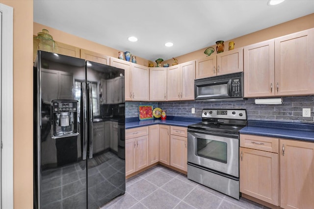 206 Wilsey Ln, Sidney, IL 61877 - kitchen featuring black appliances, light brown cabinets, dark countertops, and recessed lighting