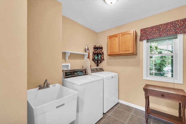206 Wilsey Ln, Sidney, IL 61877 - laundry area featuring cabinet space, washer and dryer, and dark tile patterned floors