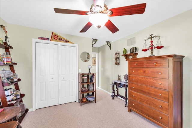 206 Wilsey Ln, Sidney, IL 61877 - bedroom with light colored carpet, a closet, and ceiling fan