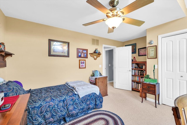 206 Wilsey Ln, Sidney, IL 61877 - bedroom with light colored carpet, a closet, and ceiling fan