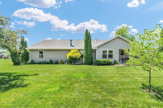 206 Wilsey Ln, Sidney, IL 61877 - rear view of house with a lawn