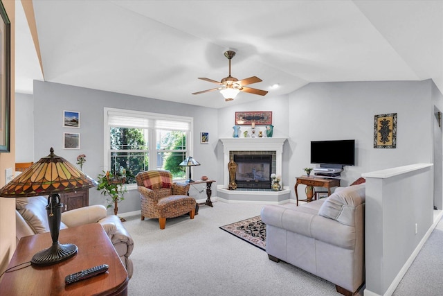 206 Wilsey Ln, Sidney, IL 61877 - carpeted living area with ceiling fan, vaulted ceiling, and a glass covered fireplace