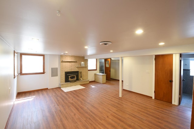 10945 S Lowe Ave, Chicago, IL 60628 - unfurnished living room with wood finished floors, healthy amount of natural light, baseboards, and recessed lighting
