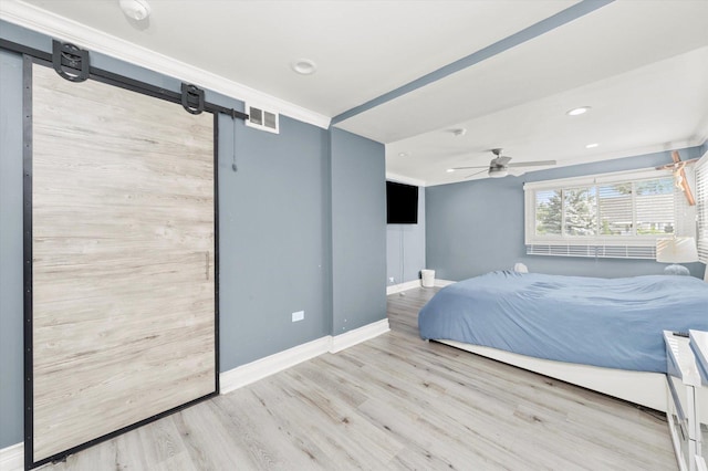 6315 W 83rd Pl, Burbank, IL 60459 - bedroom featuring a barn door, wood finished floors, recessed lighting, and a ceiling fan