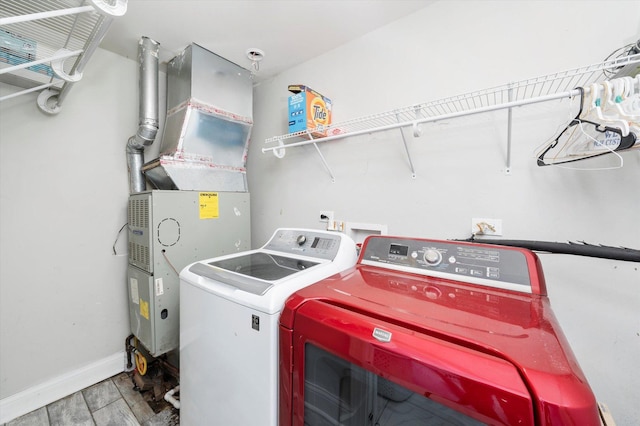 6315 W 83rd Pl, Burbank, IL 60459 - laundry room featuring washer and dryer and wood finished floors