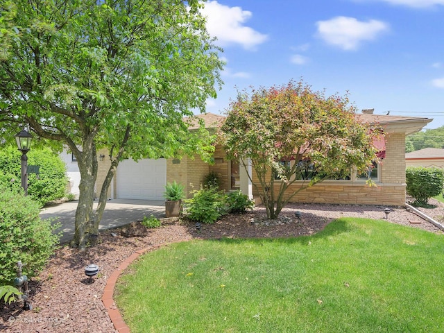 941 Meadowcrest Rd, La Grange Park, IL 60526 - obstructed view of property featuring brick siding, a garage, driveway, and a front yard