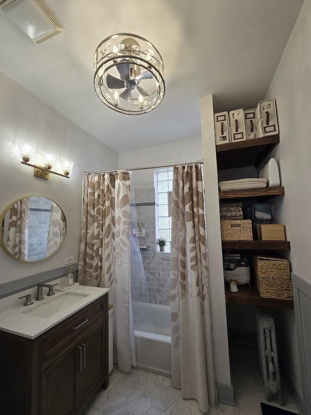 1055 E Hyde Park Blvd Unit 3, Chicago, IL 60615 - full bathroom with vanity, shower / bath combo with shower curtain, and a chandelier