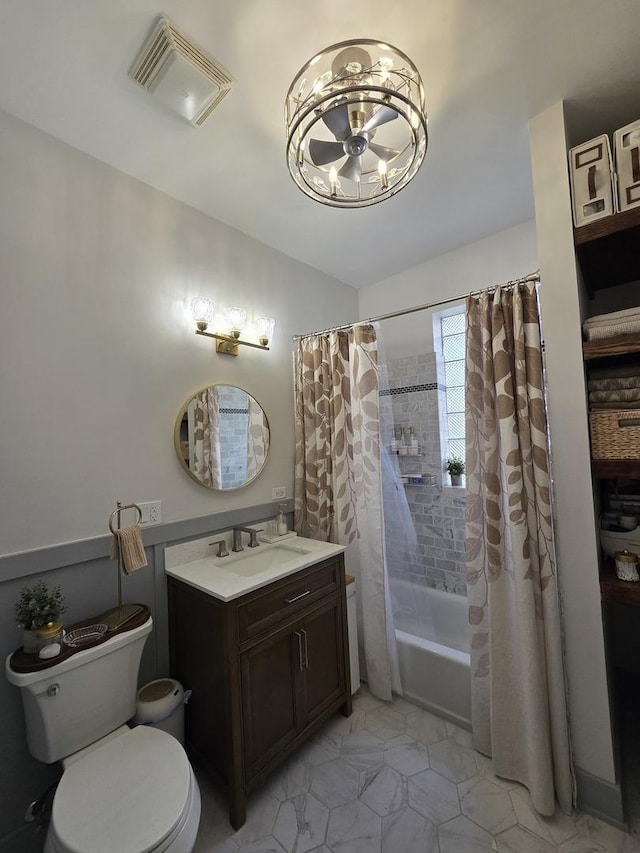 1055 E Hyde Park Blvd Unit 3, Chicago, IL 60615 - bathroom with toilet, vanity, shower / bath combination with curtain, and a chandelier