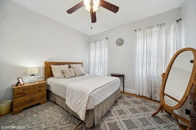 1055 E Hyde Park Blvd Unit 3, Chicago, IL 60615 - bedroom featuring ceiling fan, wood finished floors, and baseboards
