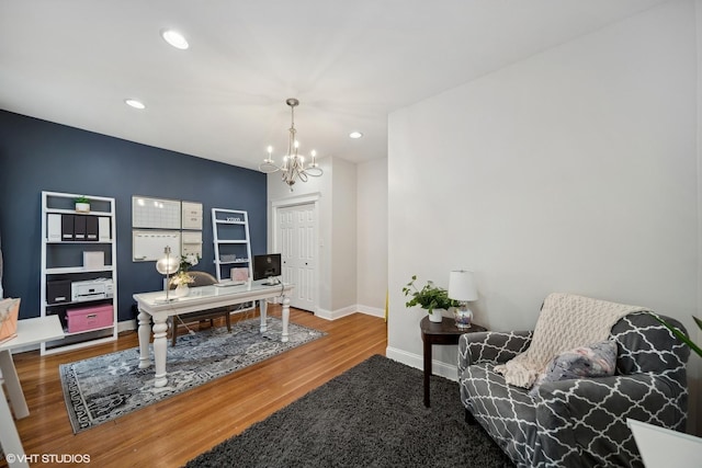 1055 E Hyde Park Blvd Unit 3, Chicago, IL 60615 - office space with a chandelier, wood finished floors, recessed lighting, and baseboards