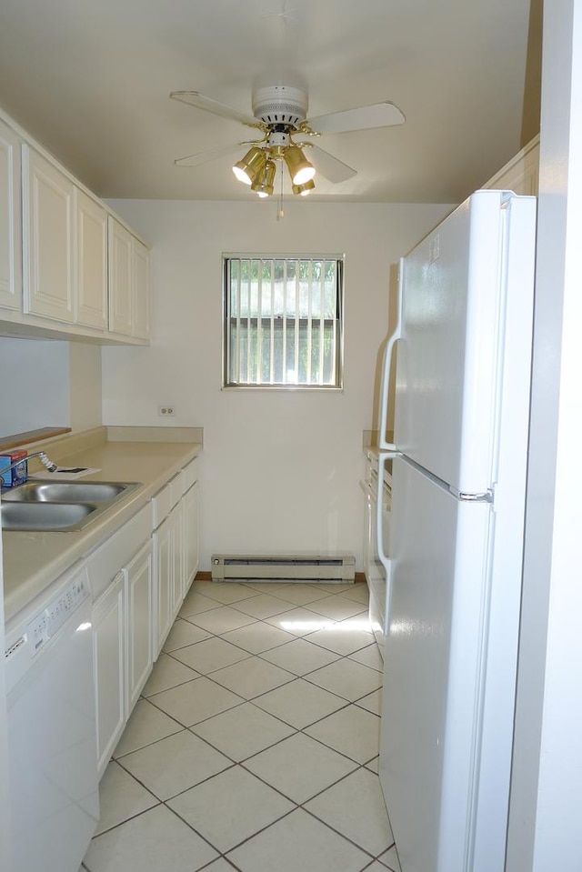 1367 N Winslowe Dr Unit 204, Palatine, IL 60074 - kitchen with white appliances, a sink, a baseboard radiator, ceiling fan, and light tile patterned floors