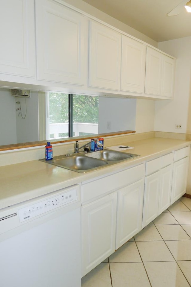 1367 N Winslowe Dr Unit 204, Palatine, IL 60074 - kitchen featuring white dishwasher, a sink, light tile patterned flooring, white cabinets, and light countertops
