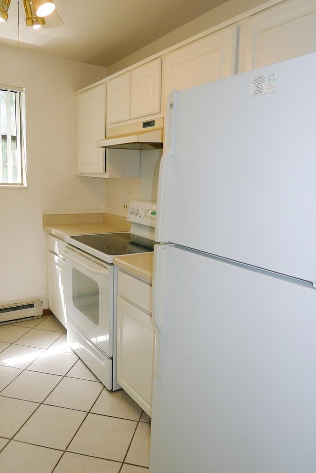 1367 N Winslowe Dr Unit 204, Palatine, IL 60074 - kitchen with white appliances, under cabinet range hood, white cabinets, light tile patterned flooring, and a baseboard heating unit