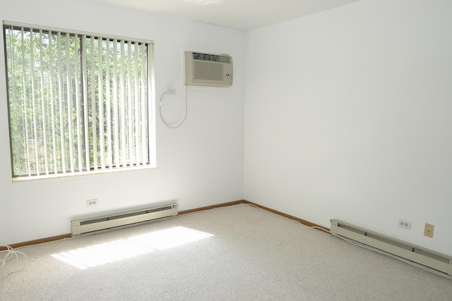 1367 N Winslowe Dr Unit 204, Palatine, IL 60074 - carpeted spare room featuring a baseboard radiator, a wall mounted air conditioner, and baseboards