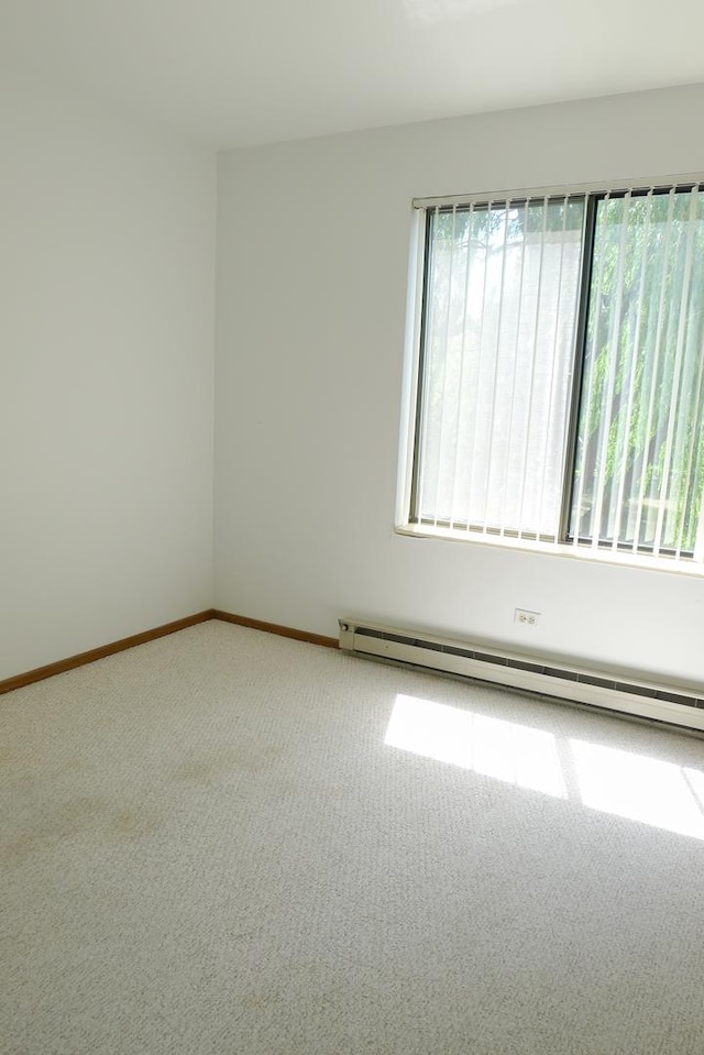 1367 N Winslowe Dr Unit 204, Palatine, IL 60074 - unfurnished room with carpet flooring, a baseboard heating unit, and baseboards