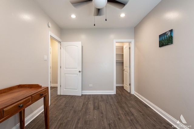 4855 W Roscoe St Unit 1, Chicago, IL 60641 - unfurnished bedroom featuring dark wood-type flooring, a walk in closet, recessed lighting, a ceiling fan, and a closet