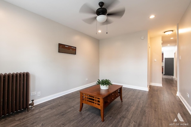 4855 W Roscoe St Unit 1, Chicago, IL 60641 - living area with radiator, dark wood-type flooring, a ceiling fan, and recessed lighting