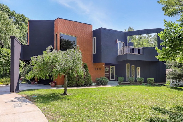 16W307 95th Pl, Burr Ridge, IL 60527 - contemporary home featuring a balcony, a front lawn, and board and batten siding