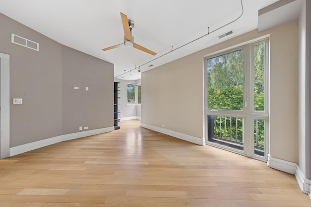 16W307 95th Pl, Burr Ridge, IL 60527 - unfurnished room with a ceiling fan and light wood-style flooring