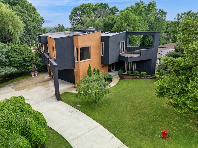 16W307 95th Pl, Burr Ridge, IL 60527 - view of front of home with concrete driveway, a balcony, an attached garage, a front yard, and stucco siding