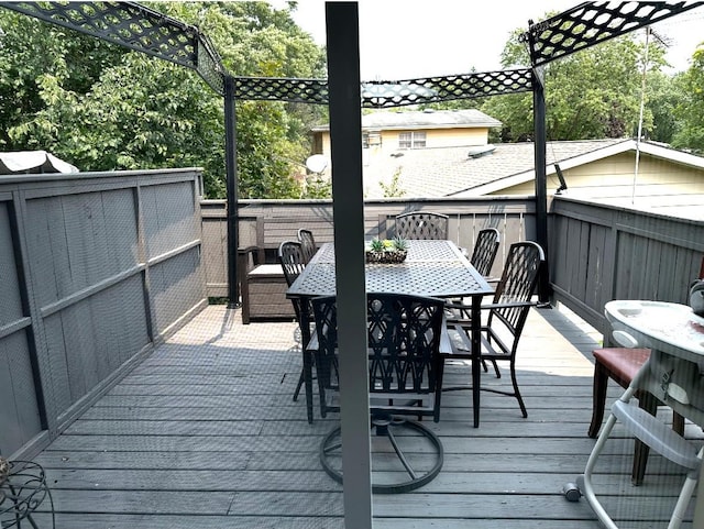 1330 Todd Farm Dr, Elgin, IL 60123 - wooden terrace with outdoor dining space
